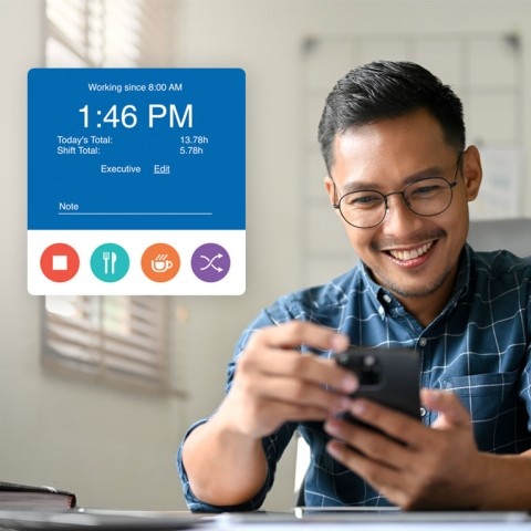 An employee tracking time on his phone