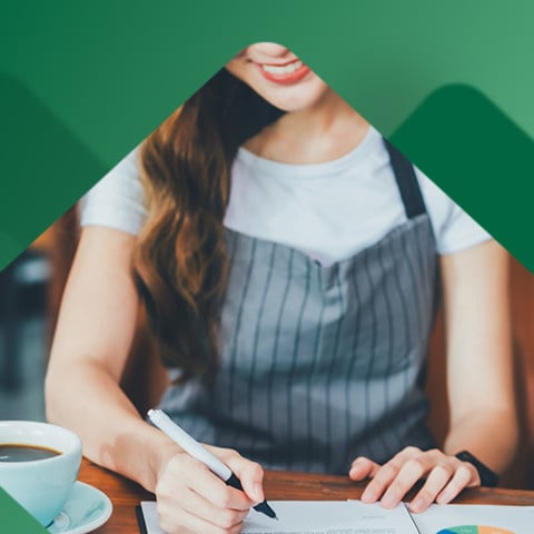 Employee filling out new hire paperwork