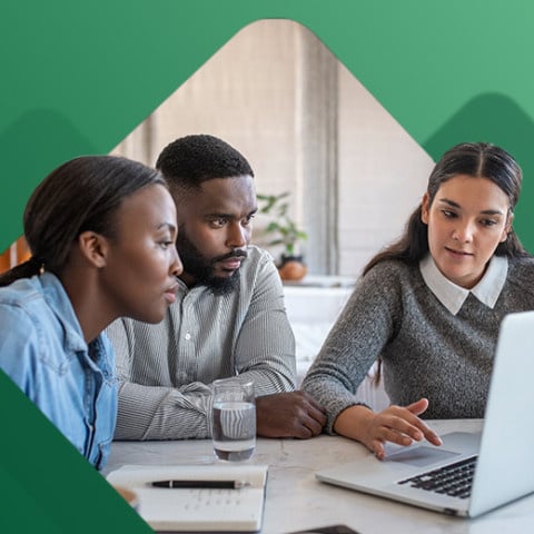 Young couple meeting with their financial advisor 