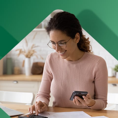 Small business owner looking at her taxes