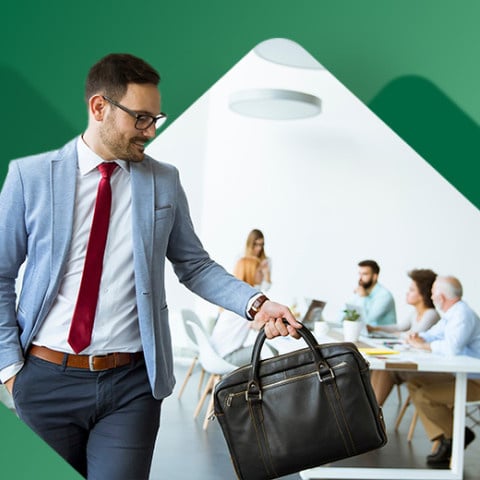 Man walking out of meeting after giving notice 