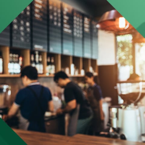 Coffee shop employees setting up for the afternoon shift