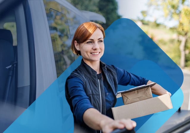 Business owner making a delivery in her vehicle