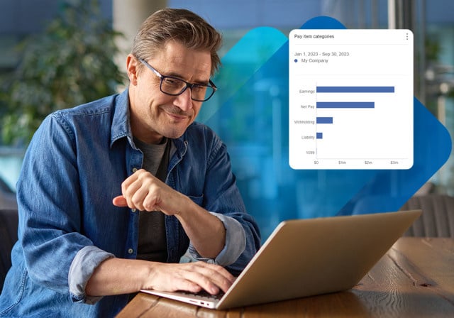 A business owner looking at a chart that shows payroll details