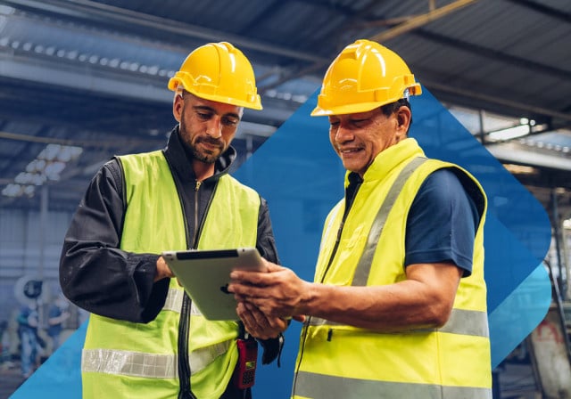Skilled workers looking at a tablet