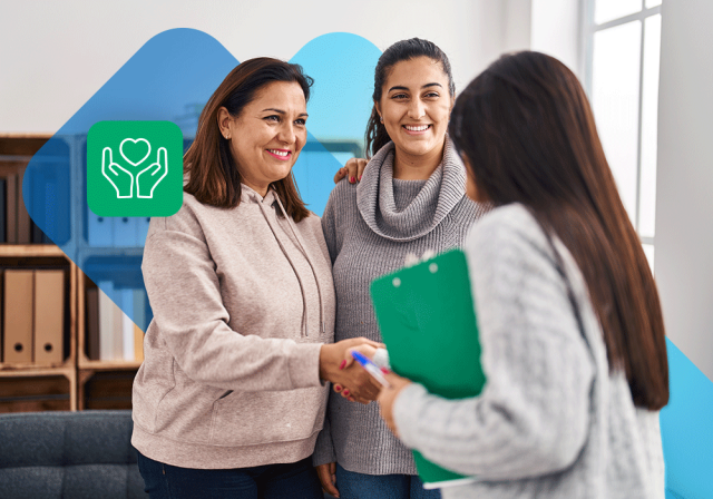 Person holding a clipboard shakes hands with another individual in an office setting, while a heart-in-hands care icon highlights support, wellbeing, and employee assistance services.