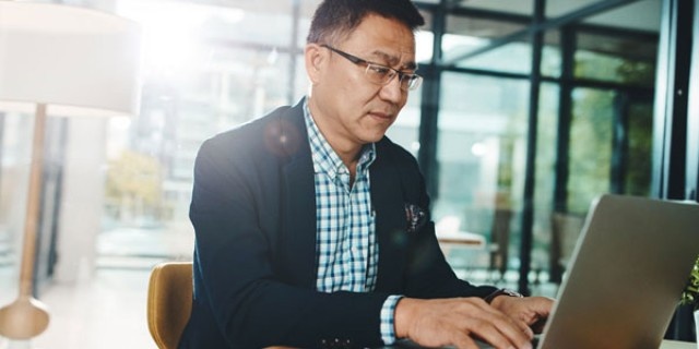 A business owner creating an employee handbook