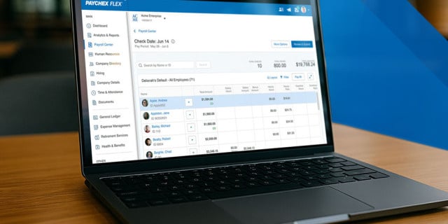 A laptop with Paychex Flex payroll center open
