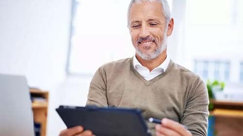 employer reviewing their payroll tax services