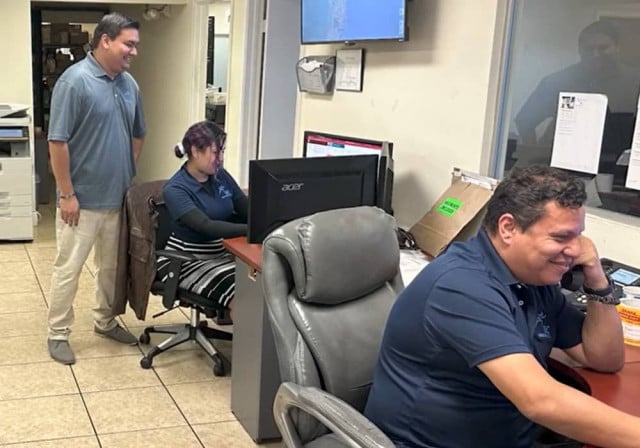 team of hispanic staff works at call center