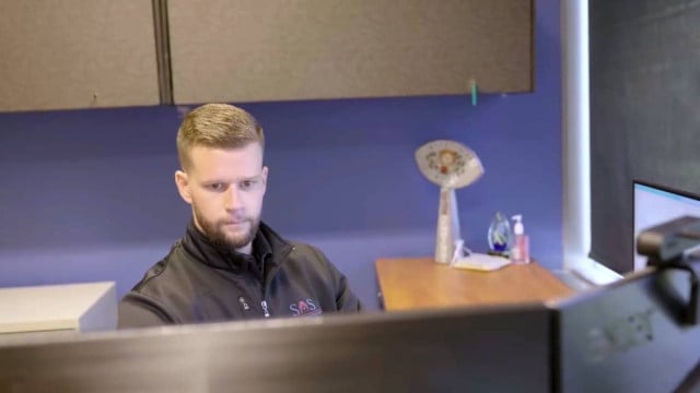 CPA works behind computer