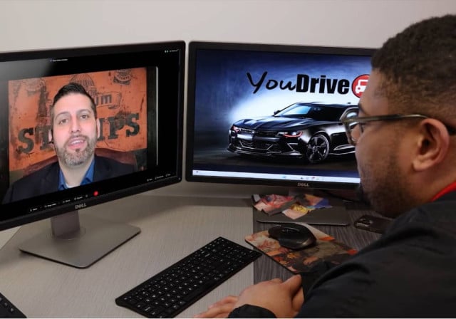 HR rep onscreen has virtual meeting with african-american auto manager