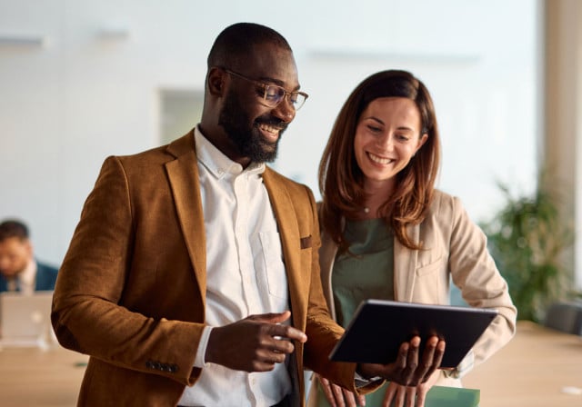 A business owner talking with a Paychex HR business partner