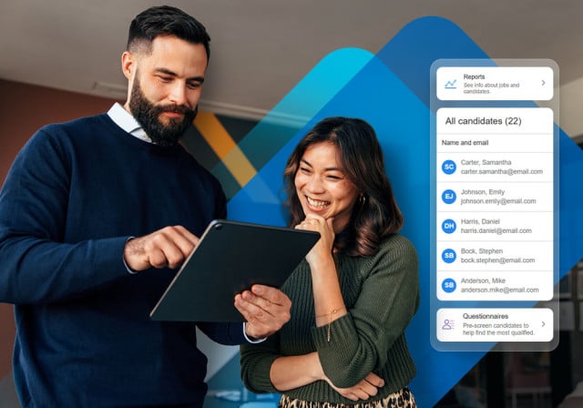 Two employees looking at talent management information within Paychex Flex