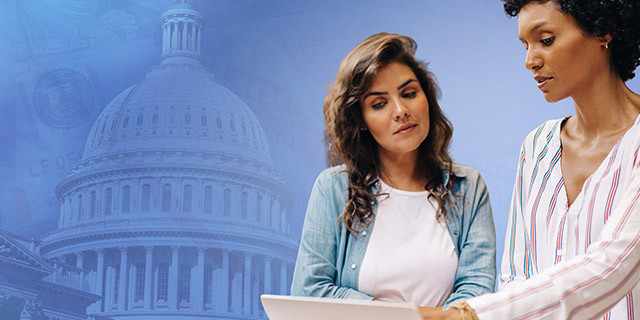 Two people stand side by side reviewing a laptop, with a large graphic of the U.S. Capitol building in the background.