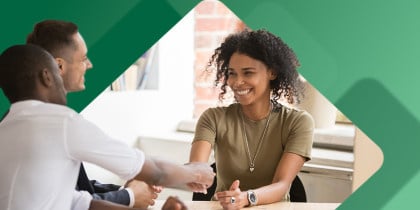 Employee shaking hand with hiring team