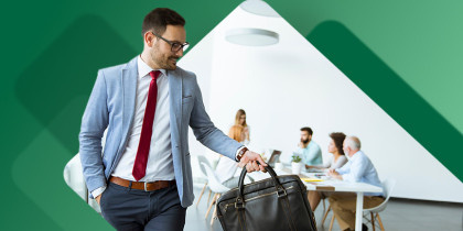 Man walking out of meeting after giving notice 