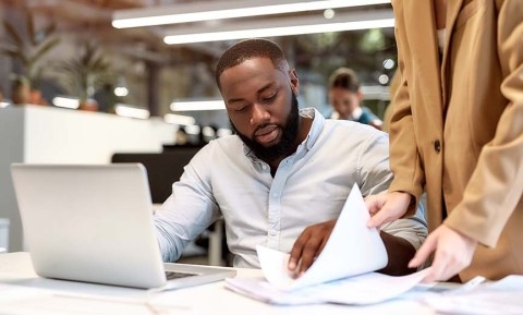 A business owner keeps documentation to improve HR compliance 