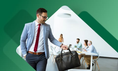 Man walking out of meeting after giving notice 