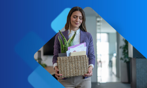 Woman carrying her items out of an office